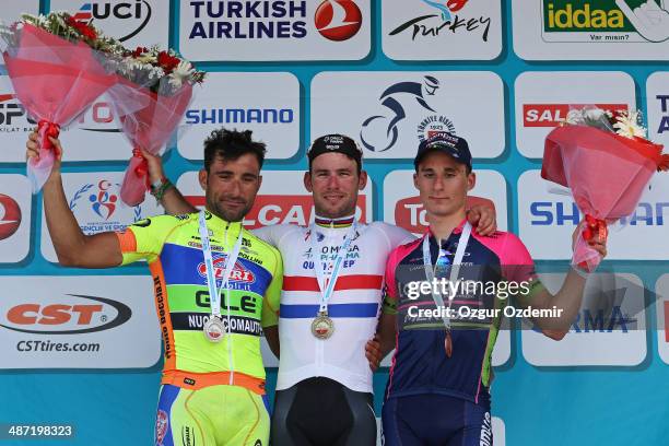 Mark Cavendish , Francesco Chicchi and Niccolo Bonifazio celebrate on the podium after the 2nd stage of the 50th Presidential Cycling Tour, a 175 km...