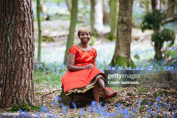 woman in a beautiful vintage style dress enjoying spring. - 1950 2015 stock pictures, royalty-free photos & images