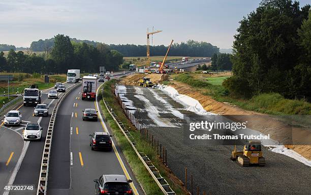 Dresden, Germany A bulldozer moving earth on a highway construction site on September 04, 2015 in Dresden, Germany.