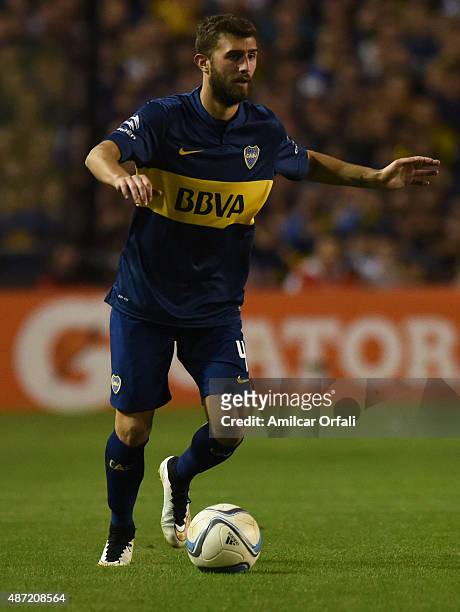 Gino Peruzzi of Boca Juniors drives the ball during a match between Boca Juniors and San Lorenzo as part of 23rd round of Torneo Primera Division...