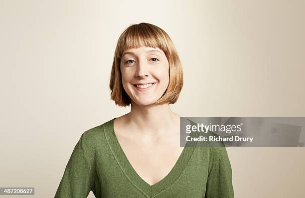 portrait of young woman smiling - neckline stock pictures, royalty-free photos & images