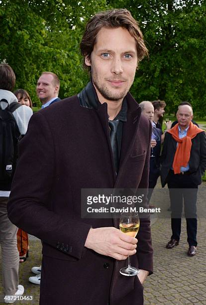 James Rousseau attends the launch of "Serpentine", a new fragrance by The Serpentine Gallery and fashion house Comme des Garcons featuring packaging...