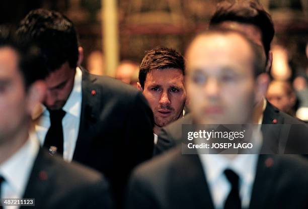 Barcelona's Argentinian forward Lionel Messi cries during a religious ceremony at Barcelona Cathedral for late former FC Barcelona's coach Tito...