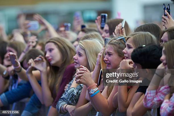 Dawid Kwiatkowski fans wait for him to perform on September 5, 2015 at Manufaktura Shapping Cenetr in Lodz, Poland. Dawid Kwiatkowski was the winner...