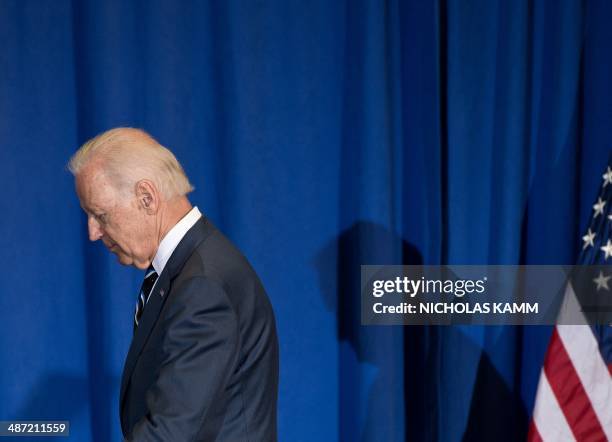 Vice President Joe Biden leaves after delivering remarks on budget and economic policy at George Washington University in Washington,DC on April 28,...