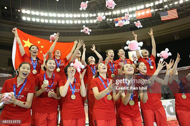 Players of China celebrate after the victory in the closing ceremony during the FIVB Women's Volleyball World Cup Japan 2015 at Nippon Gaishi Hall on...
