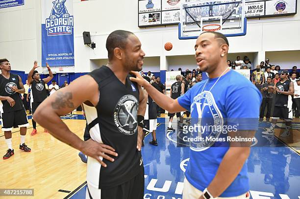Recording artist Tank and recording artist/actor Ludacris attend LudaDay Weekend Annual Celebrity Basketball Game at Georgia State University Sports...