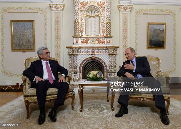 Russian President Vladimir Putin meets with his Armenian counterpart Serzh Sarkisian at the Novo-Ogaryovo residence, outside Moscow, on September 7,...