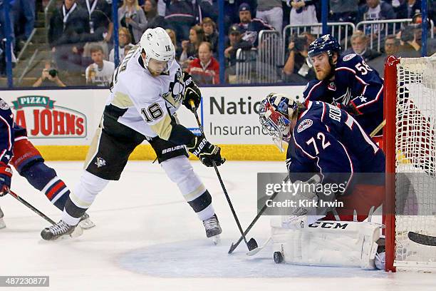 Sergei Bobrovsky of the Columbus Blue Jackets stops a shot from Brandon Sutter of the Pittsburgh Penguins during the first period of Game Six of the...