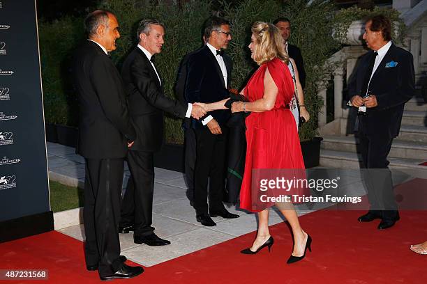 Venice Film Festival Director Alberto Barbera and Jaeger-LeCoultre Ceo Daniel Riedo greet actress Catherine Deneuve as they attend the...