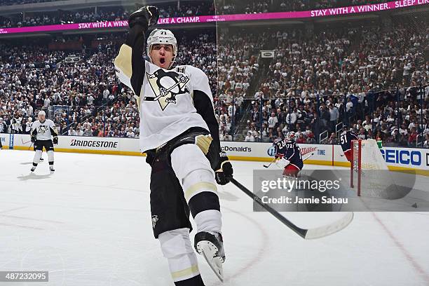 Evgeni Malkin of the Pittsburgh Penguins reacts after scoring a hat-trick goal during the second period in Game Six of the First Round of the 2014...
