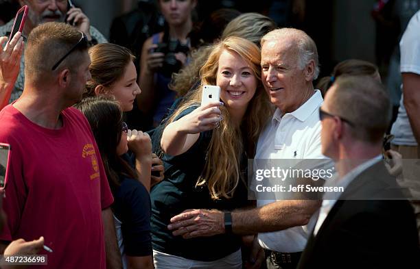 Vice President Joe Biden takes a selfie with a supporter during the annual Allegheny County Labor Day Parade Monday September 7, 2015 in Pittsburgh,...