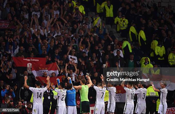 Germany players celebrate with their fans after the UEFA EURO 2016 Qualifier Group D match between Scotland and Germany at Hampden Park on September...