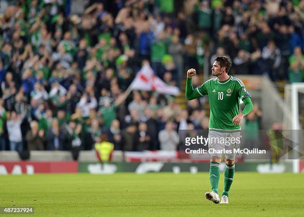 Kyle Lafferty of Northern Ireland celebrates after scoring a late equaliser during the Euro 2016 Group F qualifying match between Northern Ireland...