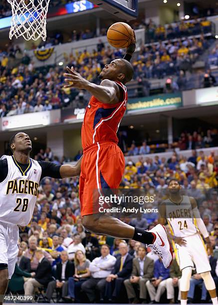 Paul Milsap of the Atlanta Hawks shoots the ball against the Indiana Pacers in Game 5 of the Eastern Conference Quarterfinals during the 2014 NBA...