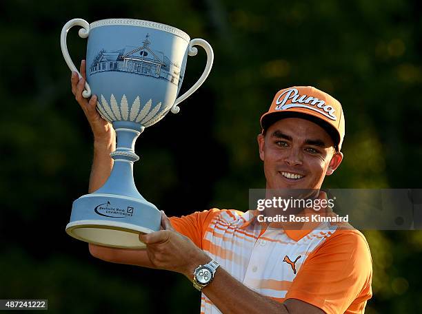 Rickie Fowler of the United States with the winners trophy after winning Deutsche Bank Championship at TPC Boston on September 7, 2015 in Norton,...