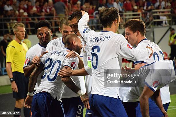 Portugal's players celebrate the goal during the Euro 2016 qualifying football match between Albania and Portugal at the Elbasan Arena in Elbasan on...