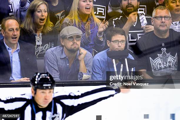 Leonardo DiCaprio and Kevin Connolly attend an NHL playoff game between the San Jose Sharks and the Los Angeles Kings at Staples Center on April 28,...