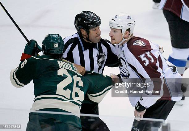 Linesman Jay Sharrers pulls apart Matt Moulson of the Minnesota Wild and Cody McLeod of the Colorado Avalanche after the Minnesota Wild won Game Six...