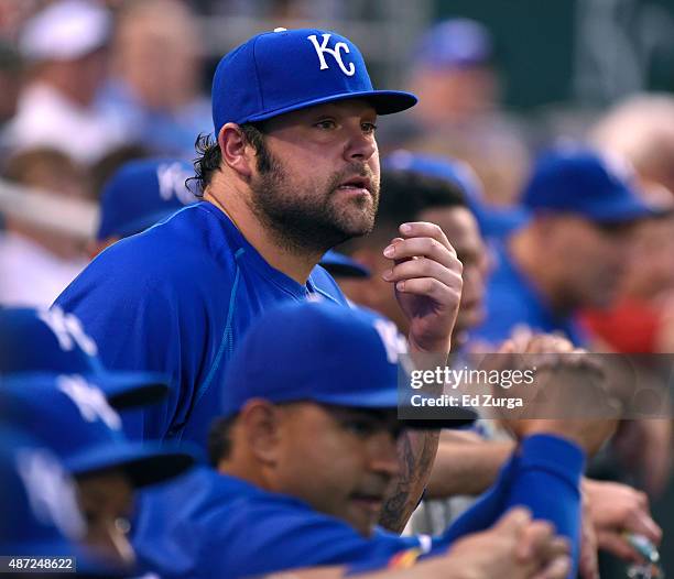 Joba Chamberlain of the Kansas City Royals watches from the dugout in the first inning against the Minnesota Twins at Kauffman Stadium on September...