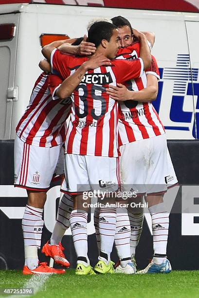 Players of Estudiantes celebrate the own goal scored by Roger Martinez of Aldosivi during a match between Estudiantes and Aldosivi as part of 23rd...