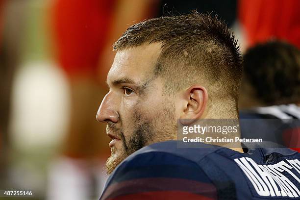 Linebacker Scooby Wright III of the Arizona Wildcats watches from the bench during the second quarter of the college football game against the UTSA...