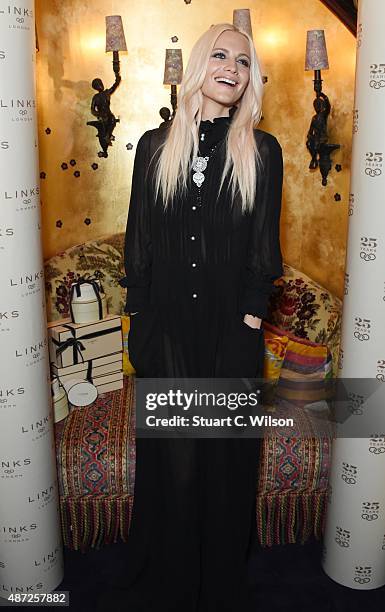 Poppy Delevingne attends the Links Of London 25th Anniversary Event at Loulou's on September 7, 2015 in London, England.