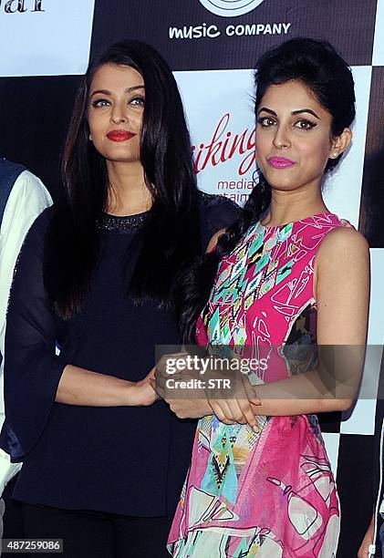 Indian Bollywood actress Aishwarya Rai Bachchan and Priya Banerjee pose during the song launch of the upcoming Hindi film 'Jazbaa' directed by Sanjay...