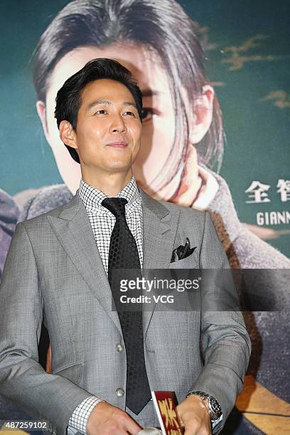 Actor Lee Jung-jae attends "Assassination" premiere at Bona Cinema on September 7, 2015 in Beijing, China.