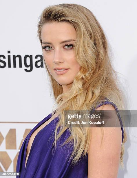 Actress Amber Heard arrives at the Los Angeles Premiere "Magic Mike XXL" at TCL Chinese Theatre IMAX on June 25, 2015 in Hollywood, California.