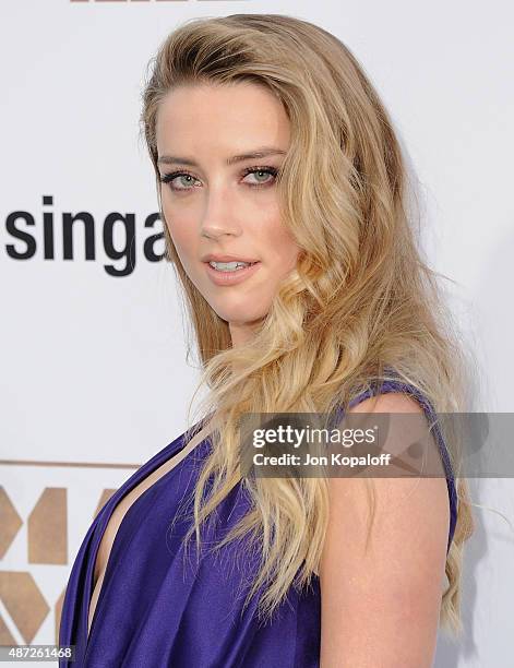 Actress Amber Heard arrives at the Los Angeles Premiere "Magic Mike XXL" at TCL Chinese Theatre IMAX on June 25, 2015 in Hollywood, California.