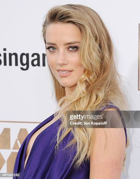 Actress Amber Heard arrives at the Los Angeles Premiere "Magic Mike XXL" at TCL Chinese Theatre IMAX on June 25, 2015 in Hollywood, California.