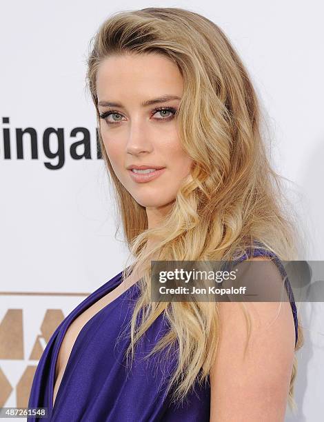 Actress Amber Heard arrives at the Los Angeles Premiere "Magic Mike XXL" at TCL Chinese Theatre IMAX on June 25, 2015 in Hollywood, California.