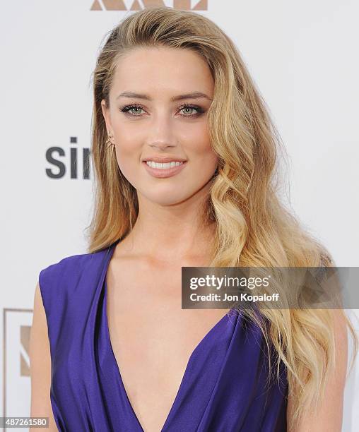 Actress Amber Heard arrives at the Los Angeles Premiere "Magic Mike XXL" at TCL Chinese Theatre IMAX on June 25, 2015 in Hollywood, California.