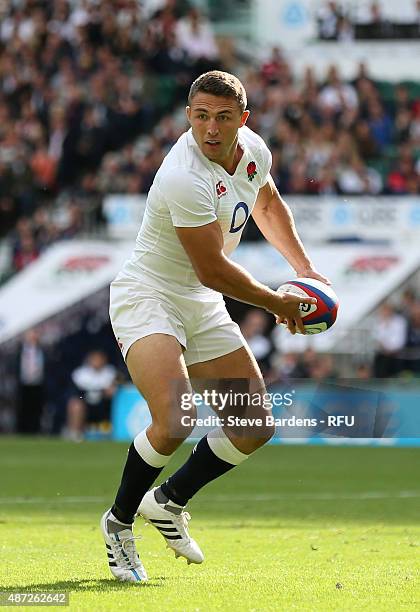 Sam Burgess of England runs with the ball during the QBE International match between England and Ireland at Twickenham Stadium on September 5, 2015...