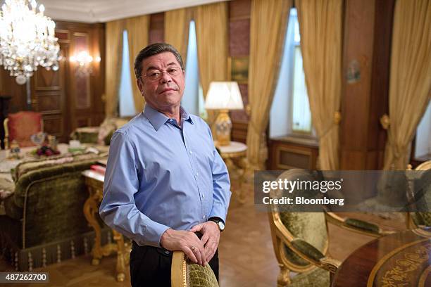 Patokh Chodiev, billionaire and co-founder of Eurasian Natural Resources Corp. , poses for a photograph at his 19th century mansion in Moscow,...
