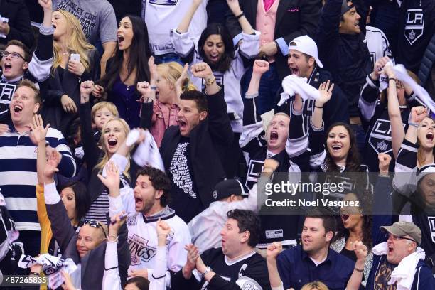 David Boreanaz and his wife Jaime Bergman attend an NHL playoff game between the San Jose Sharks and the Los Angeles Kings at Staples Center on April...