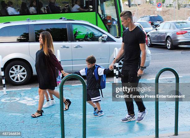 Football player Fernando Torres and Olalla Dominguez bring their son Leo Torres and Nora Torres to school on September 7, 2015 in Madrid, Spain.