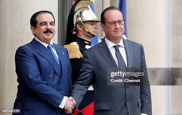 French President Francois Hollande welcomes King Hamad Bin Isa Al Khalifa of Bahrain prior their meeting at the Elysee Palace on September 08,2015 in...