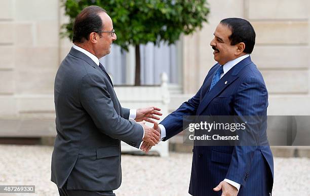 French President Francois Hollande welcomes King Hamad Bin Isa Al Khalifa of Bahrain prior their meeting at the Elysee Palace on September 08,2015 in...