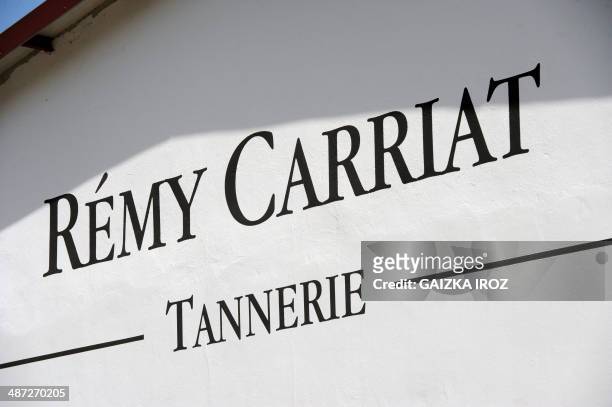 Picture taken on April 10, 2014 shows the front of the Remy Carriat tannery in Espelette, southwestern France. Since 1927, the tannery carries on the...