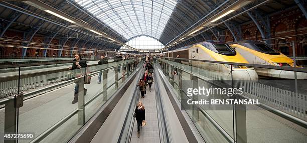Passengers arrive on a Eurostar train from Paris to Kings Cross St Pancras station in London, after a 3 day suspended service due to winter weather...