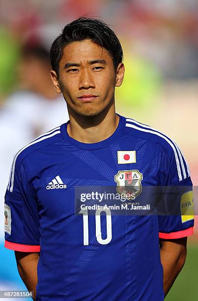 Shinji Kagawa of Japan looks on ahead of the 2018 FIFA World Cup Russia qualifier against Afghanistan at Azadi Stadium on September 8, 2015 in...