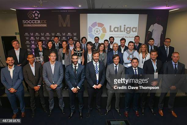 Members of La Liga marketing teams pose for a group photograph during day four of the Soccerex Global Convention at Manchester Central on September...