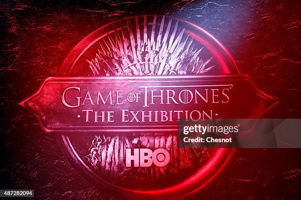 The logo of the TV serie "Games of Thrones" is displayed during the opening of an exhibition dedicated to HBO's television medieval fantasy series...