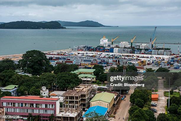 Copntainer ship stands on the dockside during loading operations at the Port of Conakry in Conakry, Guinea, on Saturday, Sept. 5, 2015. While Guinea...