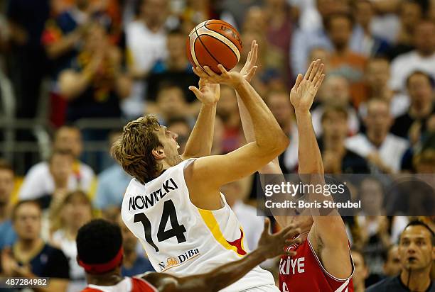 Dirk Nowitzki of Germany drives to the basket against Turkey during the FIBA EuroBasket 2015 Group B basketball match between Germany and Turkey at...