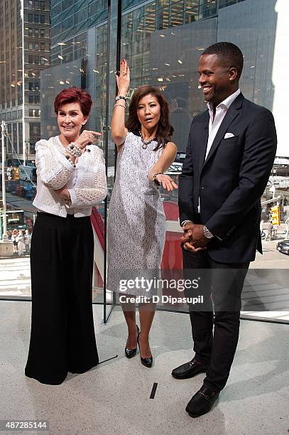 Calloway interviews Julie Chen and Sharon Osbourne during their visit to "Extra" at their New York studios at H&M in Times Square on September 8,...