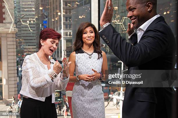 Calloway interviews Julie Chen and Sharon Osbourne during their visit to "Extra" at their New York studios at H&M in Times Square on September 8,...