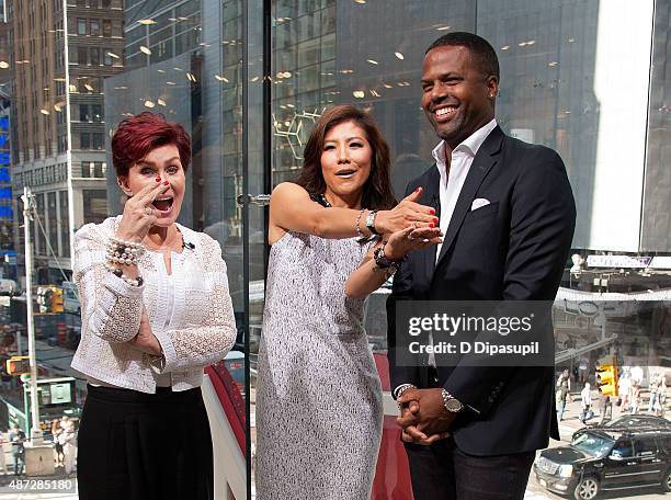 Calloway interviews Julie Chen and Sharon Osbourne during their visit to "Extra" at their New York studios at H&M in Times Square on September 8,...